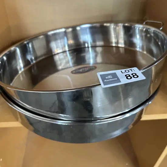 Pr of new stainless commercial pans