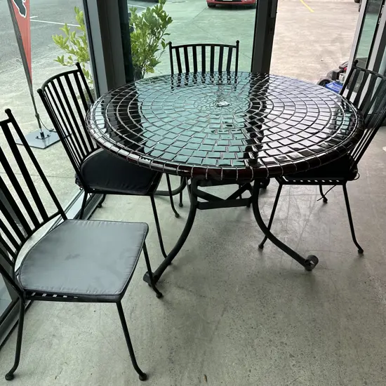 Heavy Tiled outdoor table, wrought iron base plus chairs