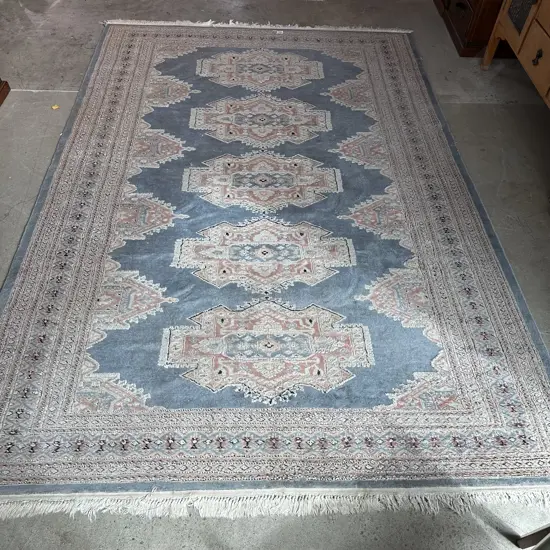 Hand knotted woolen rug 2800m x 1860