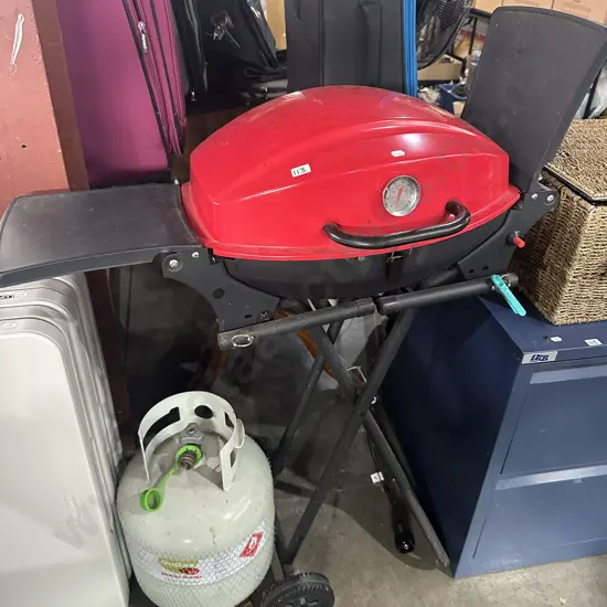 small BBQ and heavy bottle