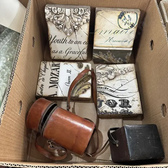 Box lot with four Sid Dickens plaques etc.