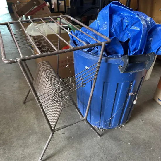 LP Stand and bin full of tarps.