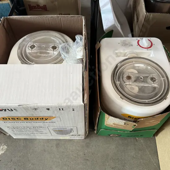 Two Disk Buddy disk repair machines.