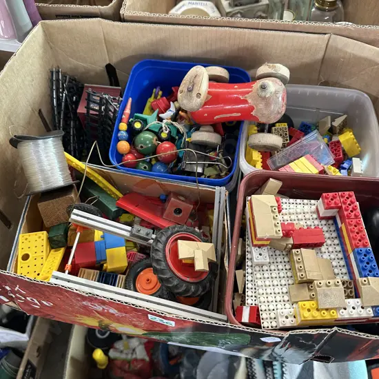 Box of toy blocks, train track, fishing line etc.