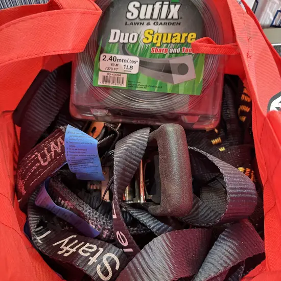 Bag of tie downs and strimmer line.