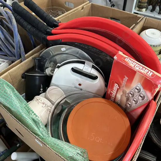 Box lot with set of three Pyrex glass bowls and four beach rackets etc.