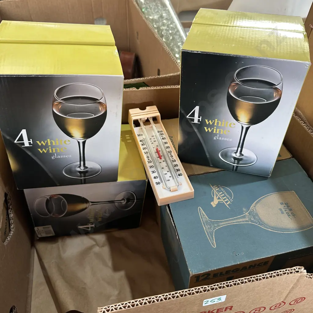 Four boxed sets of wine glasses plus a thermometer. Image 1++