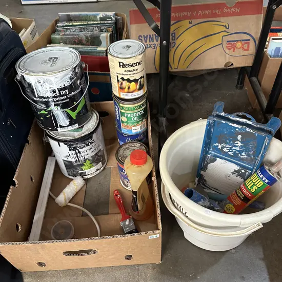 Box and bucket of paint and accessories.