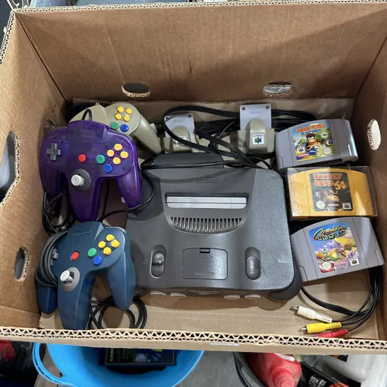 Box of Nintendo 64 Console, controllers and games etc.