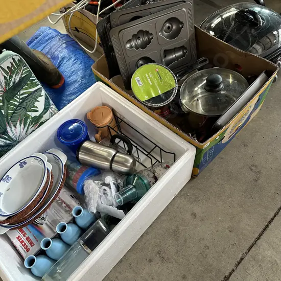 Two boxes kitchenware including a new lidded pot plus a multi cooker etc.