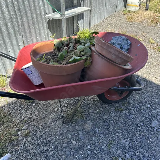 wheel barrow and planters etc