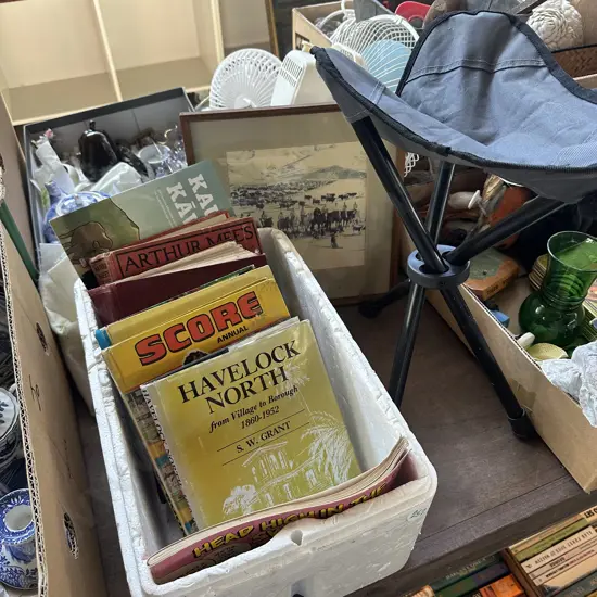 camping stool, photo and books