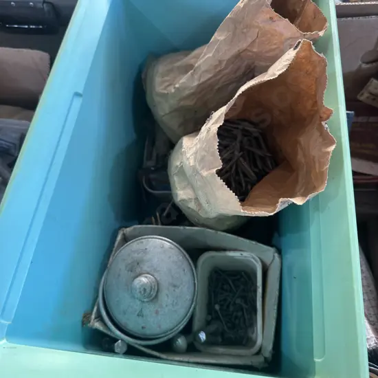 esky with fencing staples, bolts etc