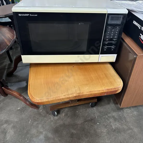 microwave, coffee table and heater