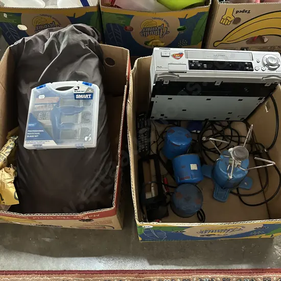 Two boxes camping, VCR player plus boxed multi-tool blade set.