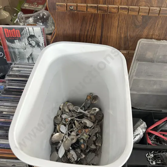 Spoon collection plus wall hangers.