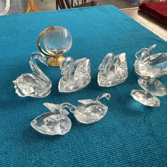Swarovski crystal swans, clam and globe