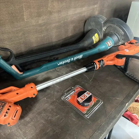 Three strimmers and spare part.