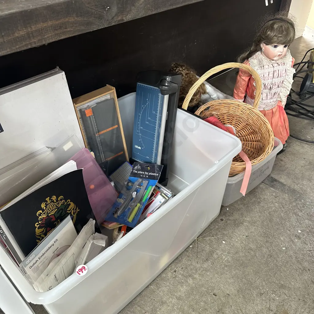 Dolls and lidded bin of  new stationary items including canvases. Image 1++