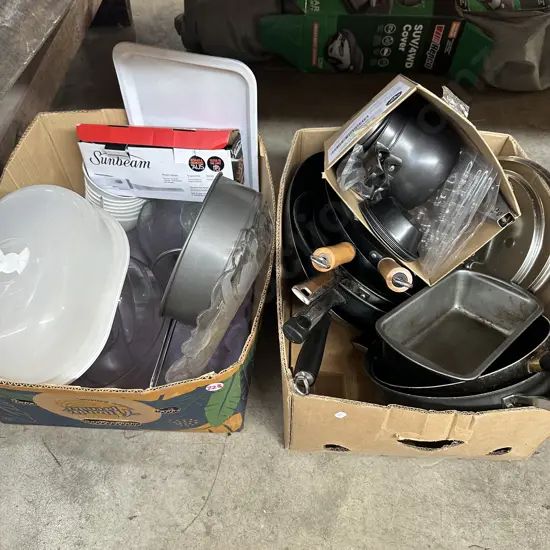Two boxes frying pans, woks, baking, plus electric knife etc.