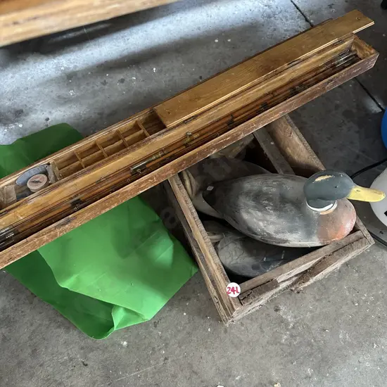 Cane split fishing rod parts in a wooden case plus beer crate and three duck decoys.