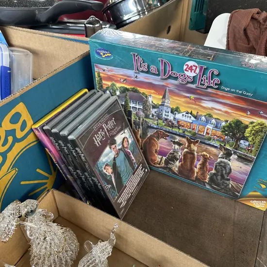 New 1000 piece puzzle and four Harry Potter DVDs plus Madagascar3.