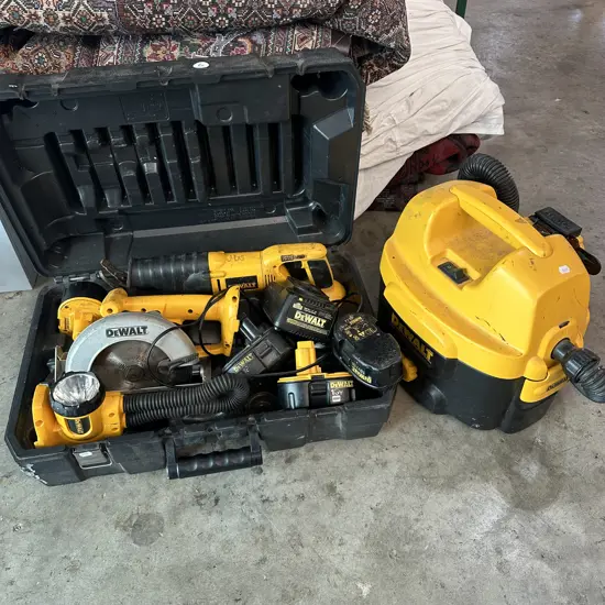 DeWalt tools including wet and dry vacuum with charger and batteries.