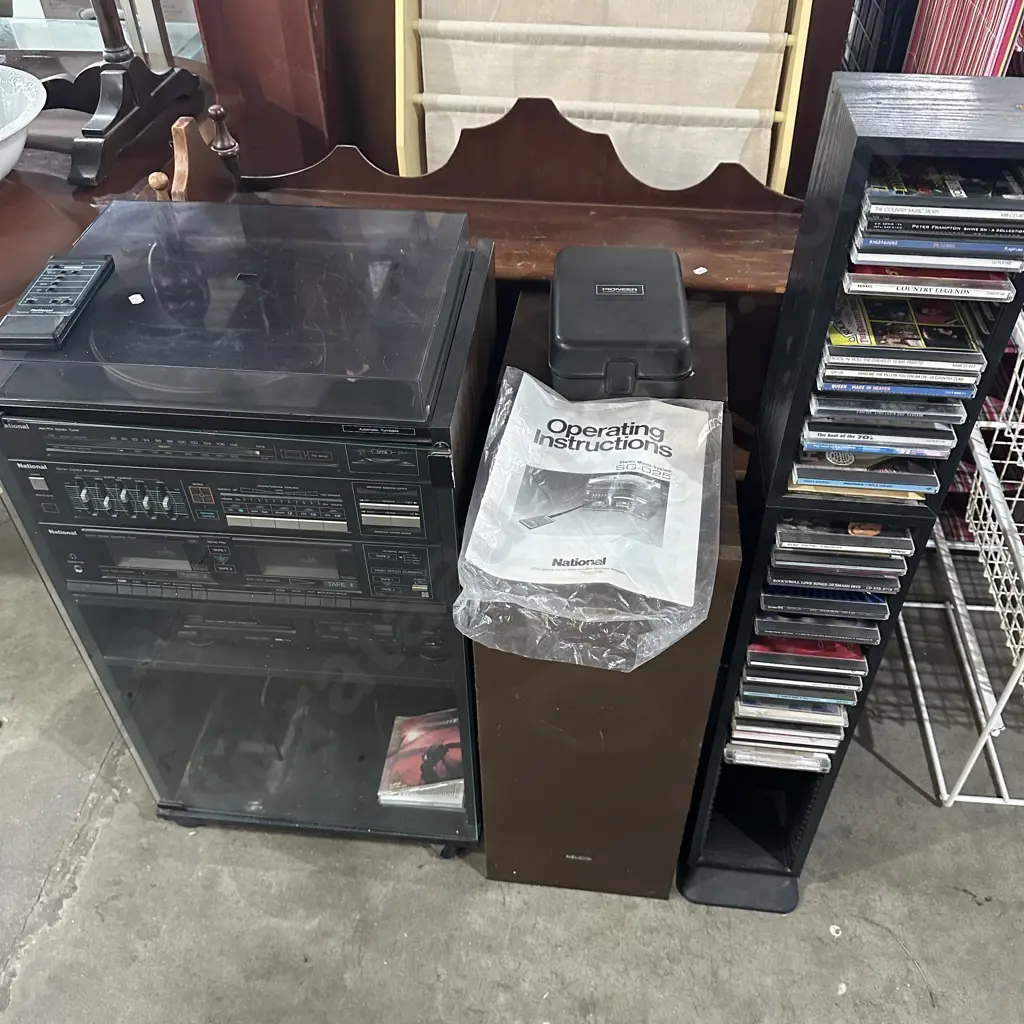 stereo system with turntable and CD colection plus bookcase Image 1++
