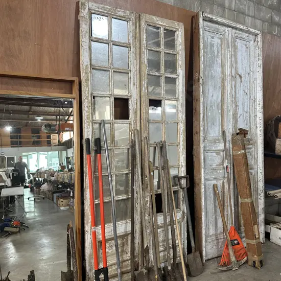 Tall mirror glass doors.