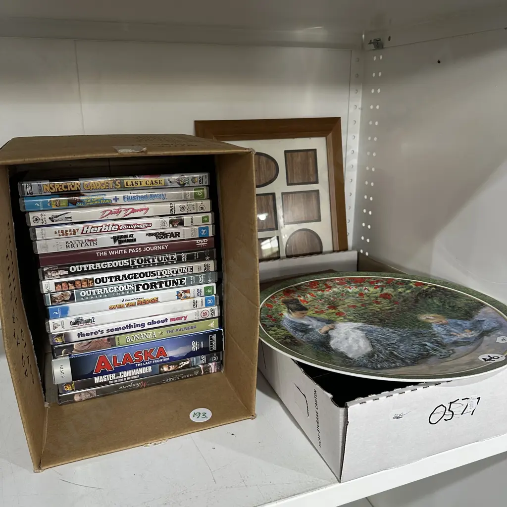 DVDs , frames and collectors plate Image 1++