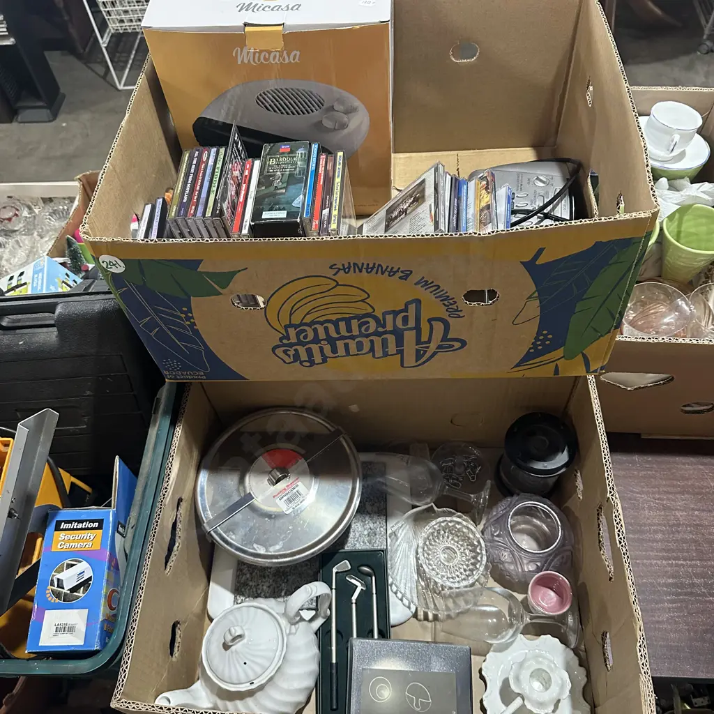 Two boxes pudding steamer, fan heater, CDs, clock/radio/alarm etc. Image 1++