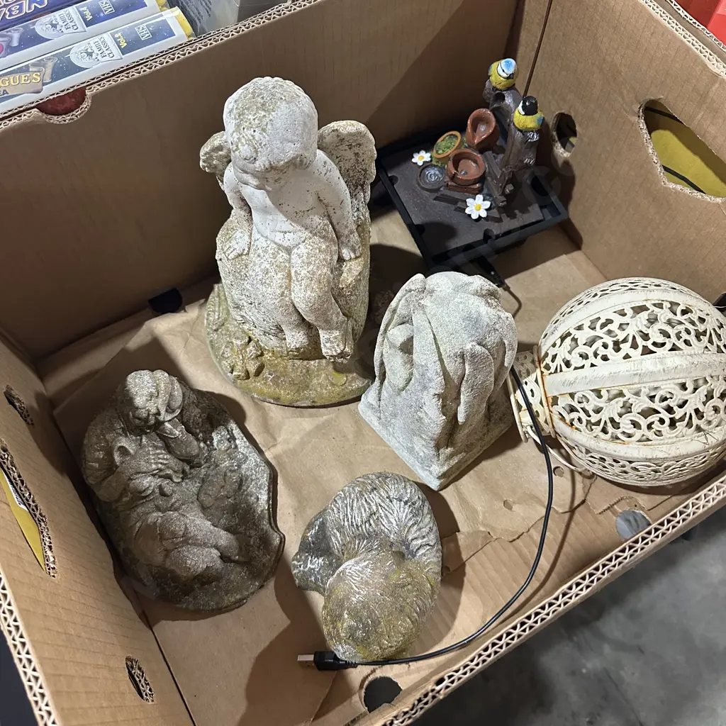 Box of garden statues etc. Image 1++
