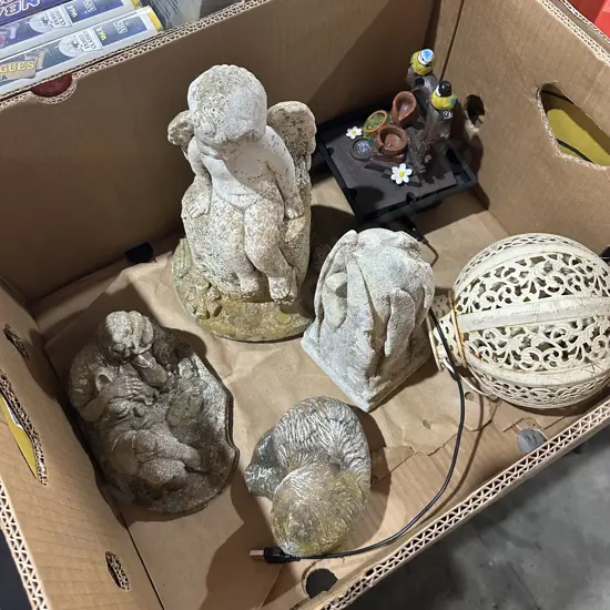 Box of garden statues etc.