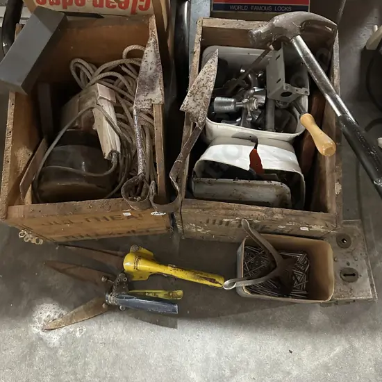 Two nail boxes and contents.
