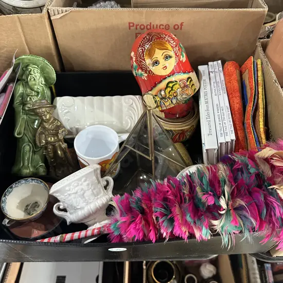 Collectables including Russian doll and brass statue.