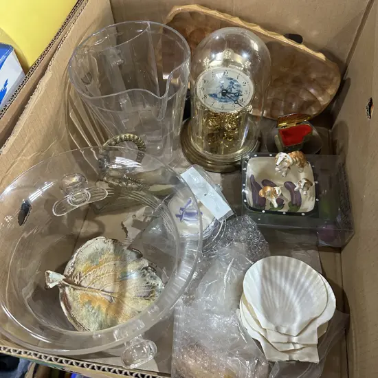 Box lot with clock, Solid brass figure, shells and pottery etc.