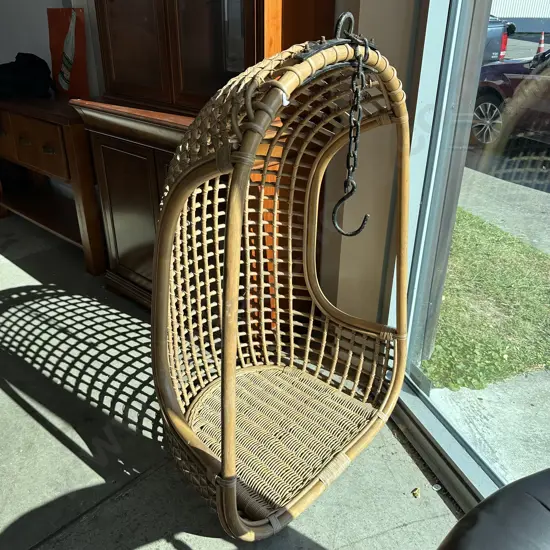 Original cane hanging seat with wrought iron bracket and hook
