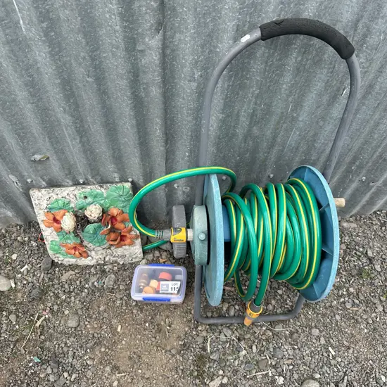 Hose, fittings and plaque