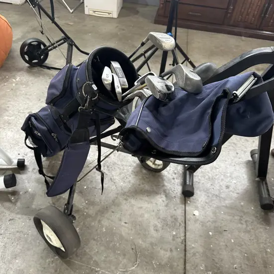 Golf clubs and trundler