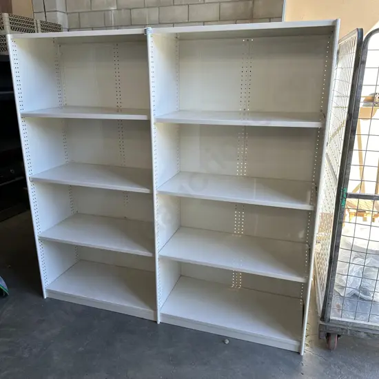 Double sided metal shelving unit
