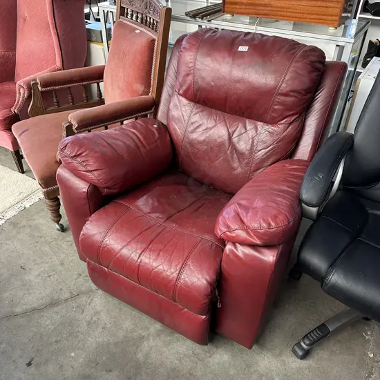 Red leather recliner - worn