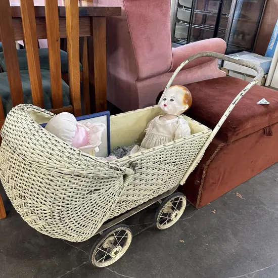 Dolls pram and contents....