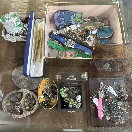 Costume jewellery and pens