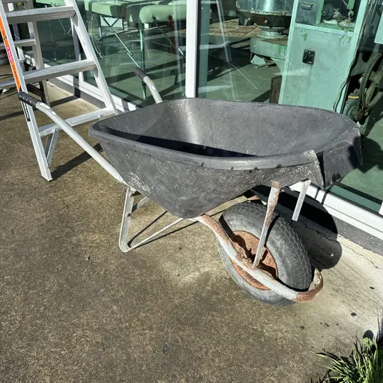 Builders barrow (rusty wheel)