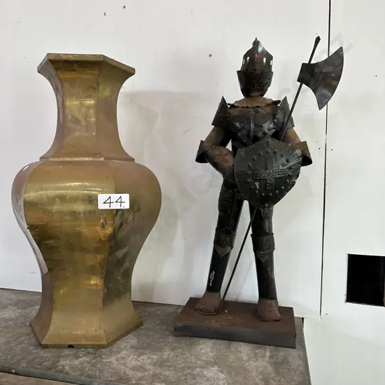 Metal figure and vase