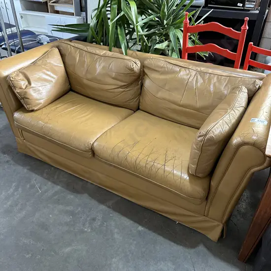 Tan leather sofa