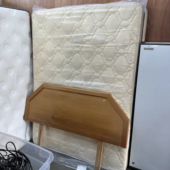 Tidy Queen bed with headboard