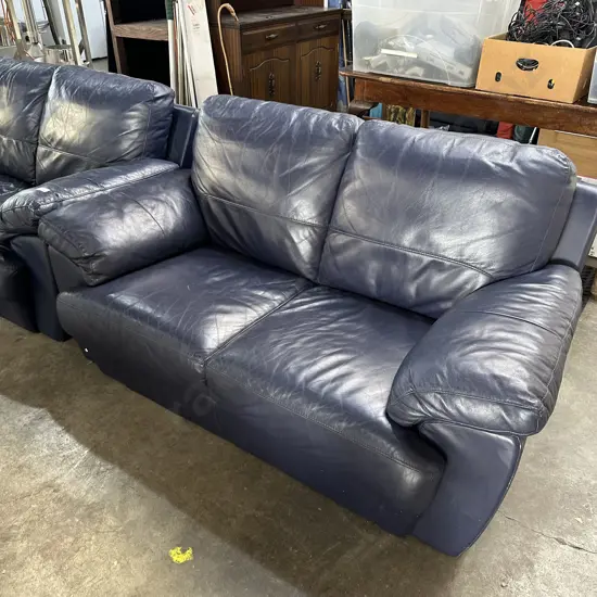 Blue leather lounge suite
