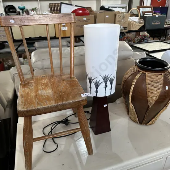Chair, lamp, pottery vase
