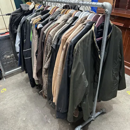 Rack of vintage jackets inc Norsewood oilskin